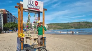 Imagem ilustrativa da imagem Criatividade para faturar renda extra com fotos de turistas em praia de Guarapari