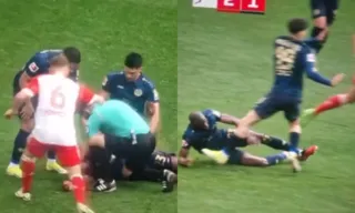 Imagem ilustrativa da imagem VÍDEO | Árbitro salva vida de jogador após choque durante jogo do Campeonato Alemão