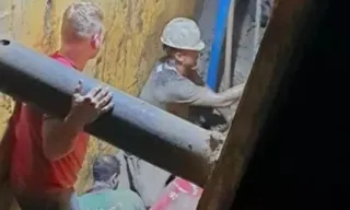 Imagem ilustrativa da imagem Trabalhador sobrevive após ficar preso em buraco de obra por 4 horas