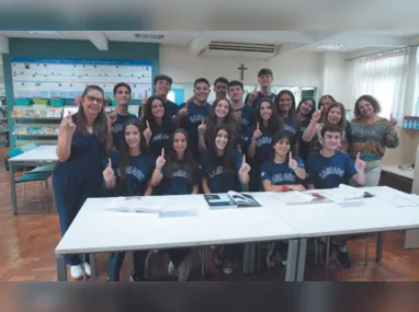 Bruno Loyola Del Caro e Renata Gazzinelli em evento de educação