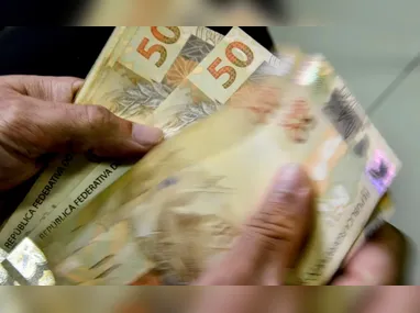 Imagem ilustrativa da imagem Caixa libera abono salarial para nascidos em julho e agosto