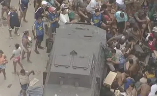 Imagem ilustrativa da imagem Polícia desiste de impedir saque de carne roubada no Rio: ‘Bem maior é a vida’