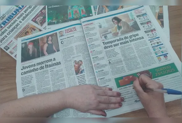 Leitora preenche cupons para concorrer ao prêmio: para participar, é preciso ter mais de 18 anos