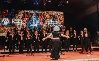 Imagem ilustrativa da imagem Entre fé e música, Coral ArcelorMittal faz apresentação gratuita na Prainha durante