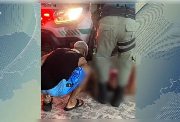 Imagem desfocada do alvo dos atiradores sendo socorrido