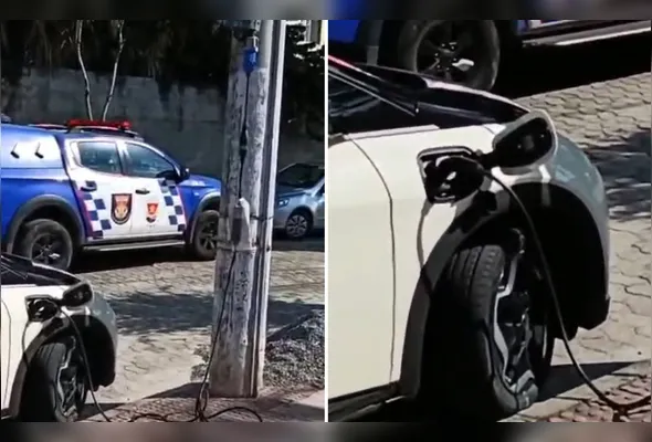 Imagem ilustrativa da imagem VÍDEO | Motorista  faz “gato” para carregar carro elétrico em Vitória