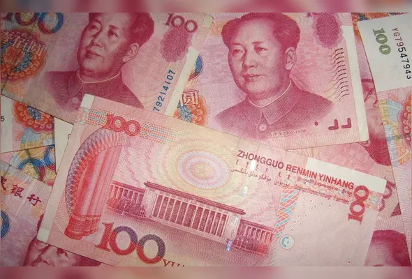 Avanço do yuan ainda está distante de representar uma substituição do dólar