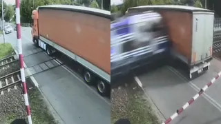 Imagem ilustrativa da imagem Vídeo mostra caminhão atingido por trem após ficar preso em trilhos