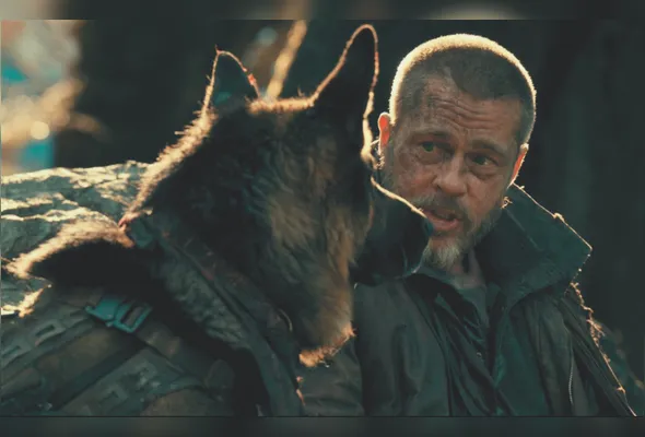 James Belmont (Brad Pitt) e o cão Odin passam por situações complicadas em meio à mata selvagem do Alasca