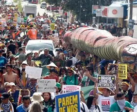 Imagem ilustrativa da imagem Em marcha global, indígenas cobram punição por morte de Guarani Kaiowá
