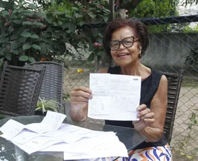 Imagem ilustrativa da imagem Aposentada renegocia e reduz dívida de R$ 16.500 para R$ 100