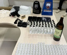 Imagem ilustrativa da imagem Dona de distribuidora é presa após loló ser encontrado em garrafa de cachaça