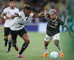 Imagem ilustrativa da imagem Fluminense 'ignora' expulsão, vence Botafogo e segue em alta no Brasileiro