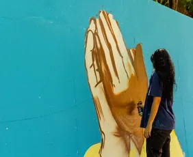 Imagem ilustrativa da imagem Grafite e fé marcam subida ao Convento na Festa da Penha 2026