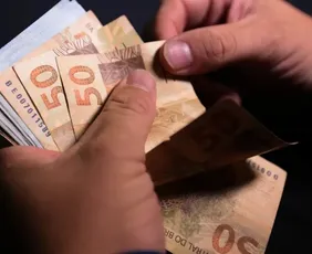 Imagem ilustrativa da imagem Caixa começa a pagar Bolsa Família de junho