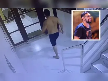 Imagem mostra Guilherme (sem camisa) chegando à portaria antes de discutir com o acusado