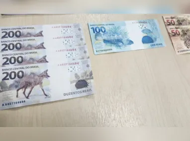 Imagem ilustrativa da imagem Homem é preso por receber R$ 1.000 em dinheiro falso pelos Correios