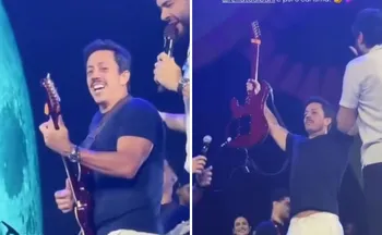 Imagem ilustrativa da imagem Humorista do ES Renato Albani chama atenção ao tocar guitarra em show de carnaval