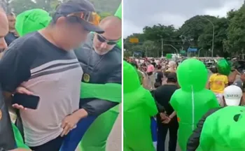 Imagem ilustrativa da imagem VÍDEO | Policiais fantasiados de alien prendem homem em bloco de Carnaval