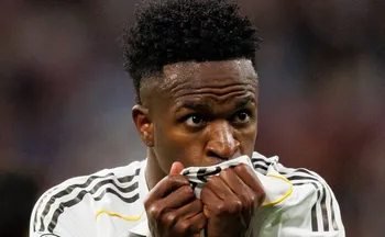 Imagem ilustrativa da imagem Vini Jr. marca e dança, Real vence Benfica e vai às oitavas da Champions