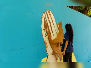 Imagem ilustrativa da imagem Grafite e fé marcam subida ao Convento na Festa da Penha 2026