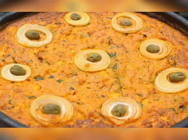 Camarão "alho e óleo", do Bar do Chico o Rei da Sarda é um dos pratos para os capixabas se deliciarem