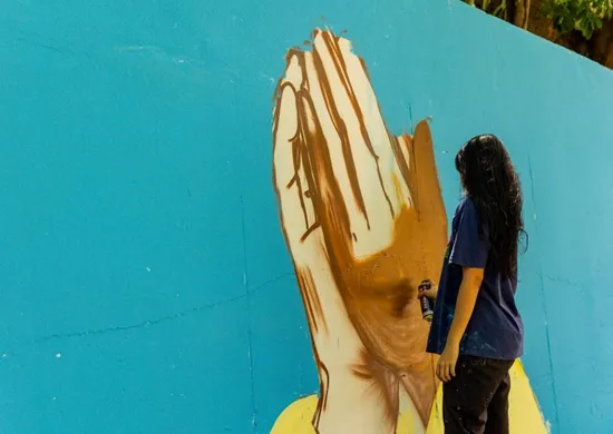 Imagem ilustrativa da imagem Grafite e fé marcam subida ao Convento na Festa da Penha 2026