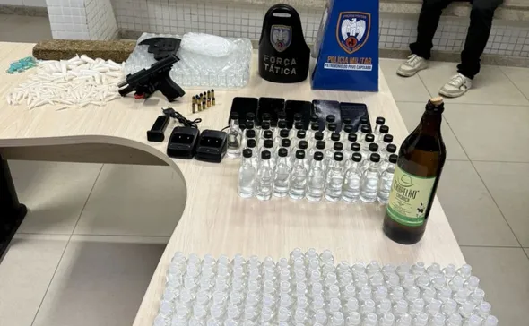 Imagem ilustrativa da imagem Dona de distribuidora é presa após loló ser encontrado em garrafa de cachaça