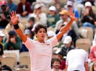 Imagem ilustrativa da imagem Guto atropela e conquista título inédito para o Brasil em Roland Garros