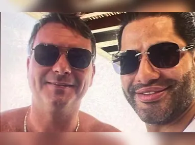 Imagem ilustrativa da imagem Site publica foto de Flávio com Sicário, apontado como chefe da milícia de Vorcaro