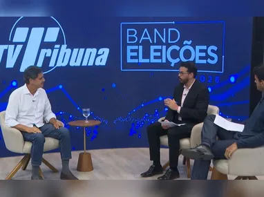 Flávio Bolsonaro e Lula durante debate promovido pela Band