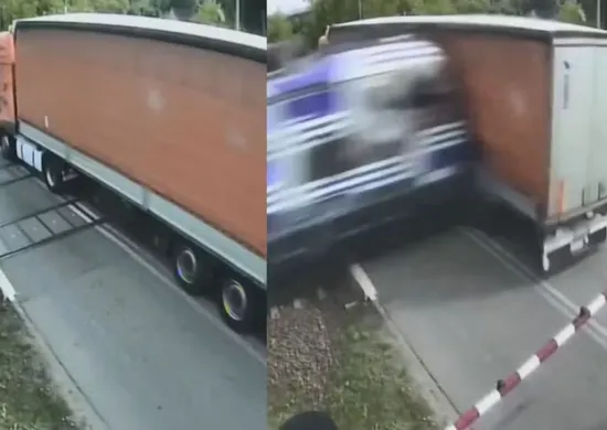 Imagem ilustrativa da imagem Vídeo mostra caminhão atingido por trem após ficar preso em trilhos