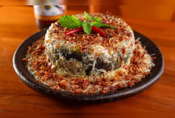 Localizado em Jacaraípe, o Bar do Mineiro competiu com o prato 'Entrecôte ao Creme', que leva creme de aipim com bacon, linguiça calabresa, filé de costela bovina desfiado, queijo muçarela maçaricado e farofa de bacon.