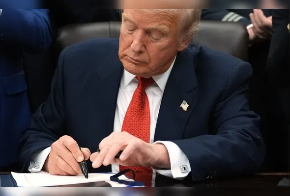 Imagem ilustrativa da imagem Boa notícia para o ES, Trump reduz tarifa de produtos brasileiros