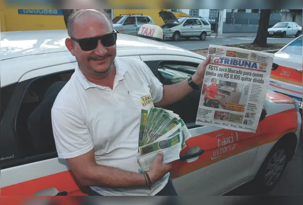 O taxista Marcos Paulo Coelho vai depositar os cupons hoje na urna: “Estou na expectativa de ganhar”