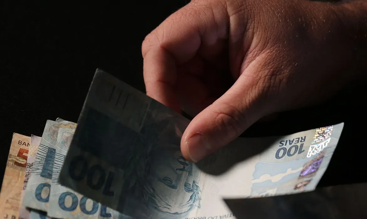 Imagem ilustrativa da imagem Caixa paga Auxílio Brasil a cadastrados com NIS final 9