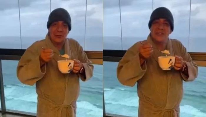 Imagem ilustrativa da imagem Zeca Pagodinho estreia "look" de inverno com gorro, roupão, meia e chinelo