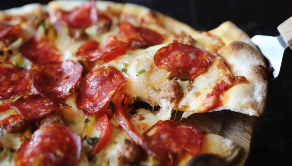 Imagem ilustrativa da imagem Pizza como salário? Anúncio de emprego gera polêmica
