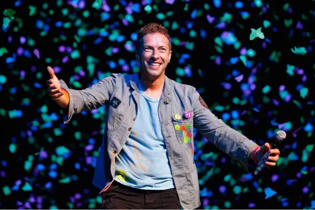 Imagem ilustrativa da imagem Vocalista do Coldplay diz que se apresentar no Brasil é como "chegar ao paraíso"