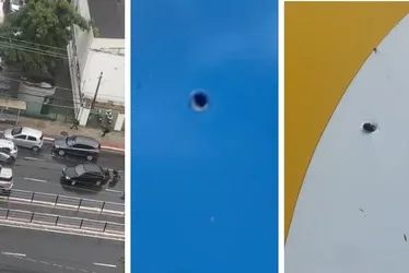 Imagem ilustrativa da imagem Motoristas ficaram presos no fogo cruzado. Tiros atingiram casas e comércios