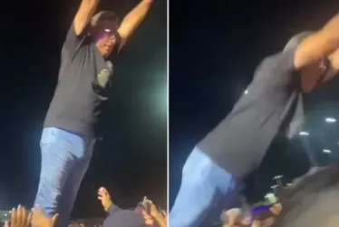 Imagem ilustrativa da imagem Vídeo | Prefeito se empolga em festa, se joga na plateia e cai no chão