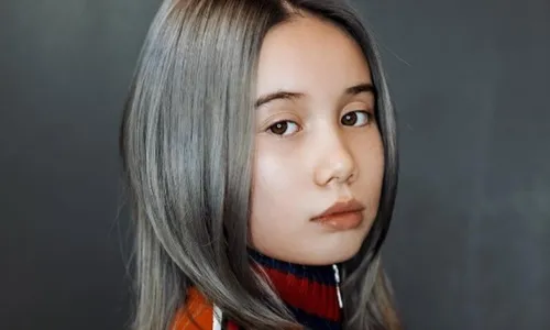 
          Imagem ilustrativa da imagem Após perfil oficial anunciar morte, rapper Lil Tay diz que conta foi hackeada
          