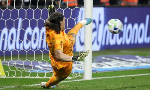 
          Imagem ilustrativa da imagem Cássio pega dois pênaltis e coloca o Corinthians na semifinal da Copa do Brasil
          