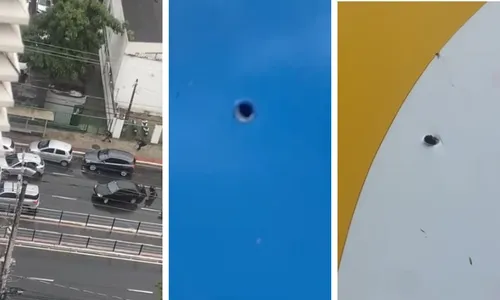 
          Imagem ilustrativa da imagem Motoristas ficaram presos no fogo cruzado. Tiros atingiram casas e comércios
          