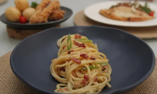 
          Imagem ilustrativa da imagem Quinze receitas de chefs para surpreender amigos e família
          