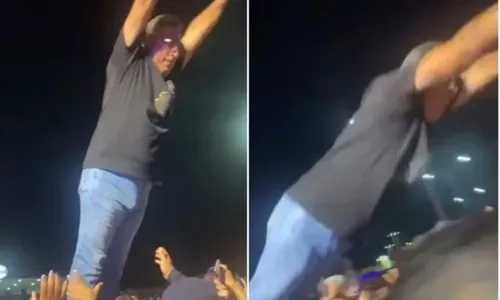 
          Imagem ilustrativa da imagem Vídeo | Prefeito se empolga em festa, se joga na plateia e cai no chão
          