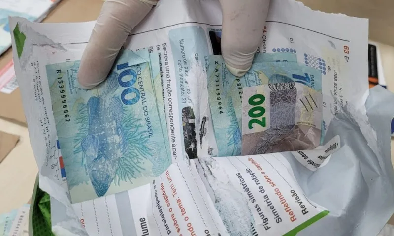 Imagem ilustrativa da imagem VÍDEO | Polícia Federal apreende R$ 11 mil em notas falsas em Cariacica