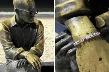 Imagem ilustrativa da imagem Fã de Taylor Swift põe 'pulseira da amizade' em estátua de Drummond