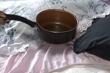 Imagem ilustrativa da imagem Marido é preso após jogar óleo quente e manter mulher em cárcere privado em Viana