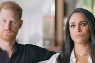 Imagem ilustrativa da imagem Príncipe Harry e Meghan Markle são cortados do casamento de padrinho do filho